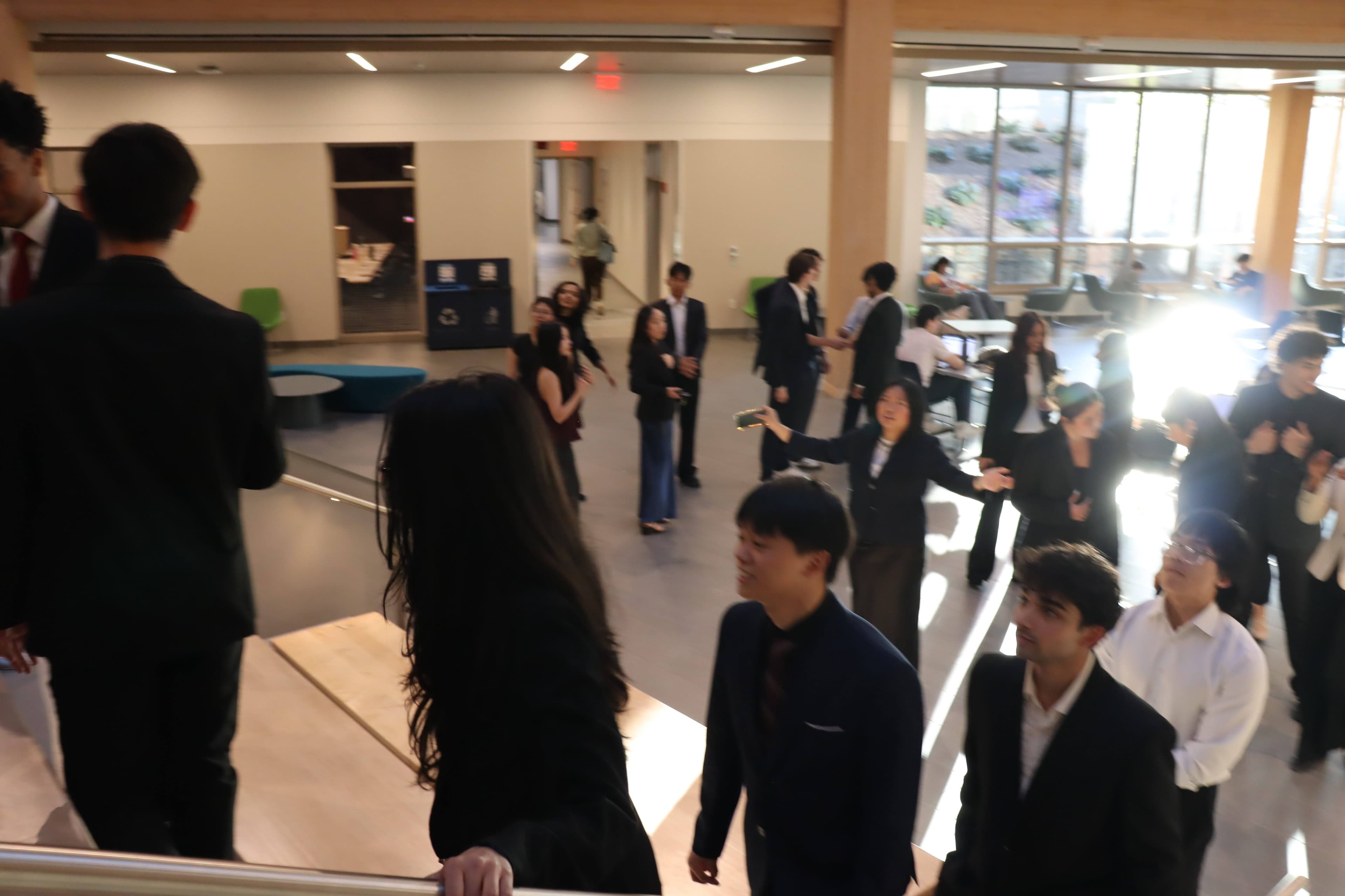 TEK members gathering in professional attire